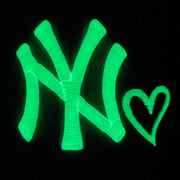 Glow in the dark Yankees and Heart logo embroidery on the New York Yankees Glow In The Dark 27x World Series Champs Patch Pink Bottom Side Patch 59Fifty Fitted Cap