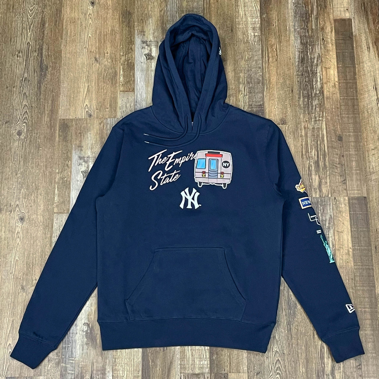 front of the New York Yankees "City Transit" 59Fifty Fitted Matching Navy Pullover Hoodie