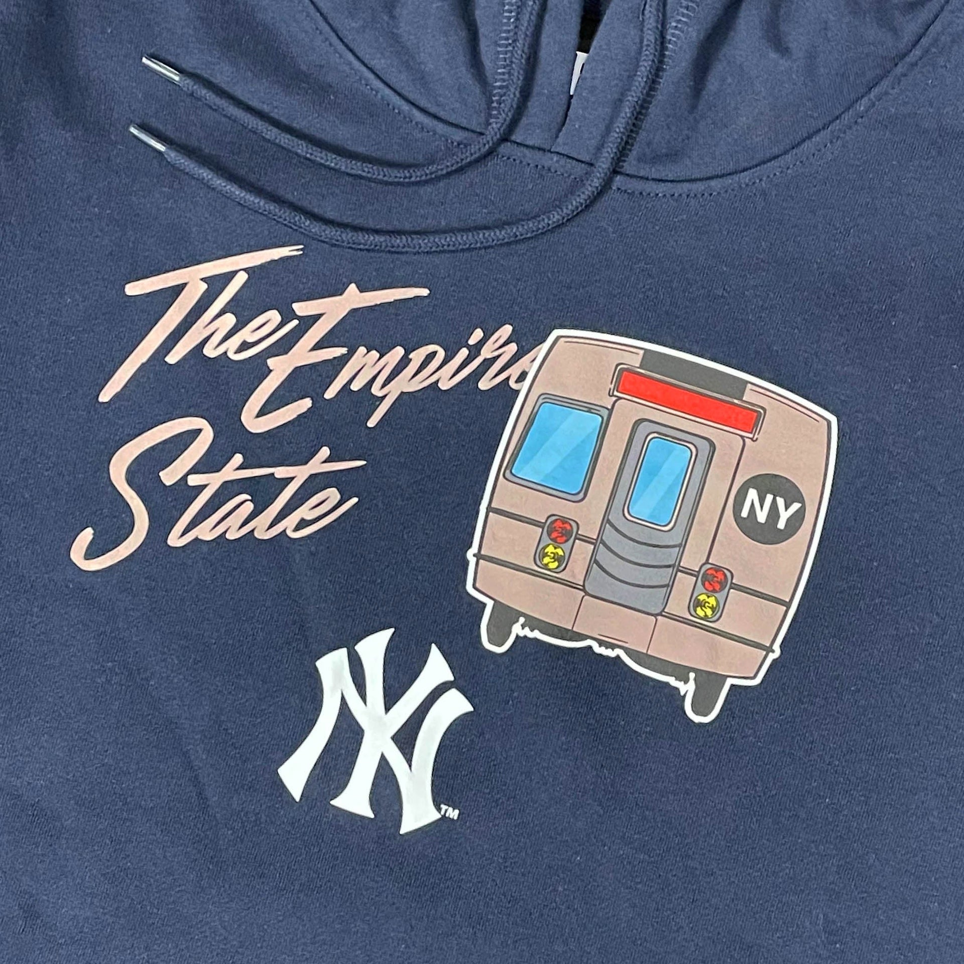 Logo shot of the New York Yankees "City Transit" 59Fifty Fitted Matching Navy Pullover Hoodie